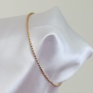 Textured gold bangle